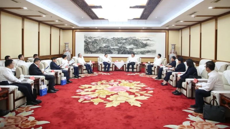 宋海良與內(nèi)蒙古自治區(qū)黨委常委、呼和浩特市委書記包鋼座談