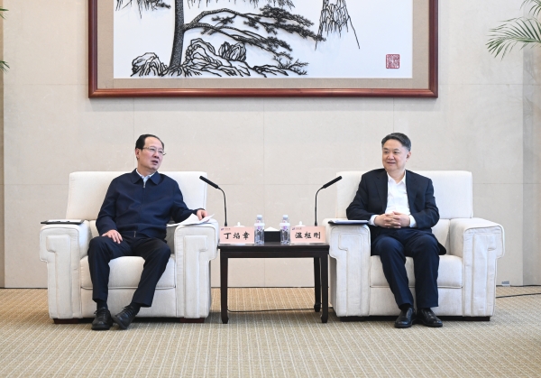 丁焰章與中國華能董事長、黨組書記溫樞剛會談